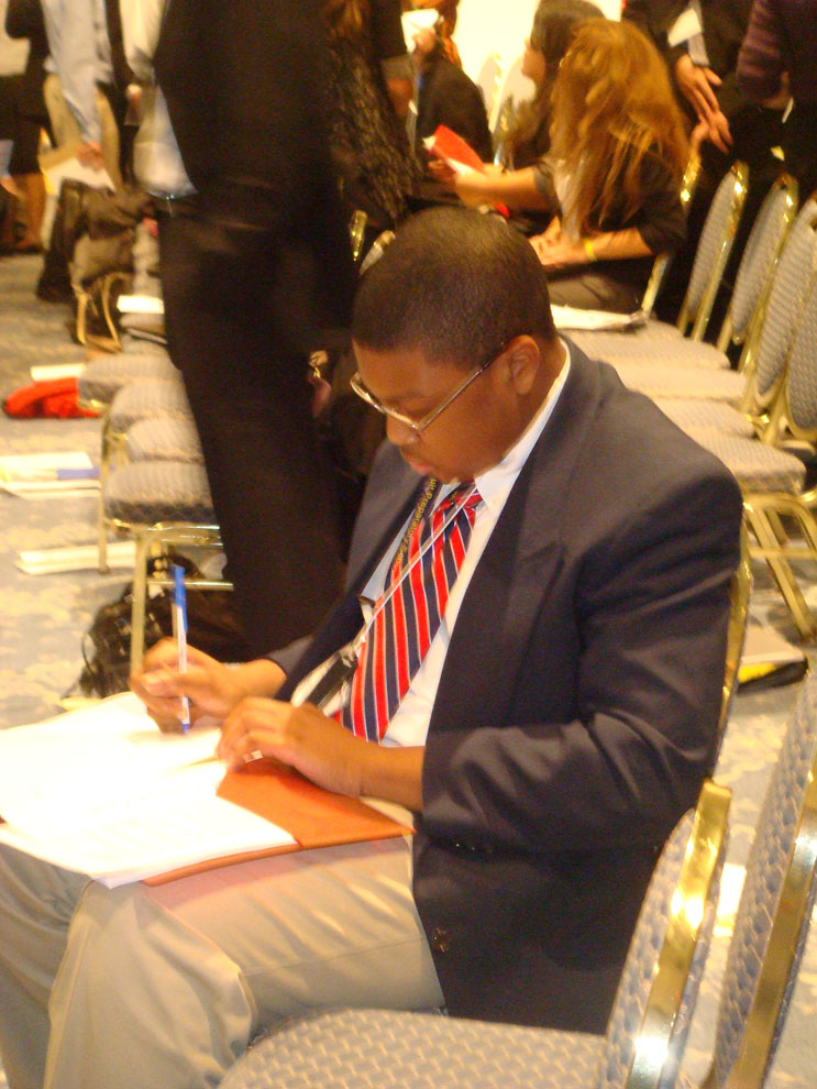 23. John Ukenye working on a position paper