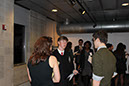 25 Senior, James Brandt Roen engages two delegates, discussing his proposed resolution