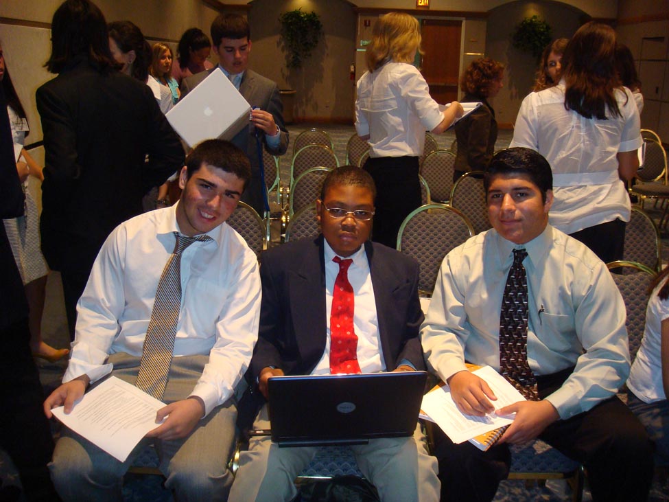 26 Thorvald Sanchez,John Ukenye and Michael Argryris working on a resolution paper