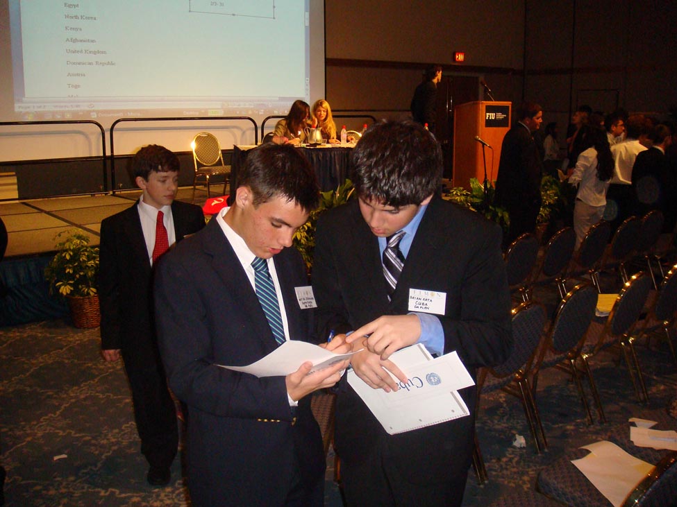 30 Matias Stanham works with Delegate from Cuba