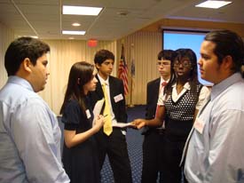 15 Gilbert Serein and Alejandro De los Santos working in unmoderated caucus